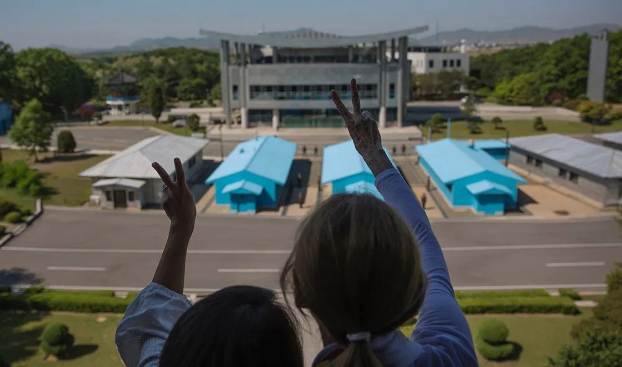 Christine Ahn and Gloria Steinem share a message of peace at the Joint Security Area